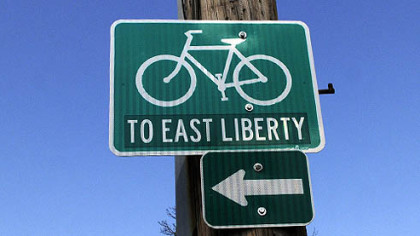 The City of Pittsburgh has signs suggesting bicyclists going to East Liberty turn off Penn Avenue on Brushton Avenue, where this sign points you down Meade Street.