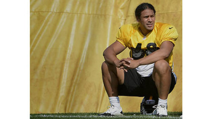 Troy Polamalu takes a break  during afternoon workouts at training camp at St Vincent College.