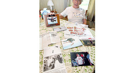 Clara White, 88, sits with various forms of memorabilia inside her home in Wapwallopen, Pa. Ms. White planned to sky-dive for the eighth time in honor of her 88th birthday.