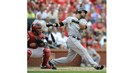 Garrett Jones strikes out with the bases loaded in the ninth inning as the Cardinals held on for a 5-4 win Saturday at Busch Stadium in St. Louis.