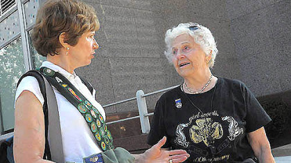 Virginia Halt, 92, shown here at right with her daughter Sandra Fischer, was honored by the Girl Scouts for more than 30 years of service as part of today's parade Downtown celebrating the organization's 100th anniversary. The parade theme was "100 Years of History and a Future of Possibilities."