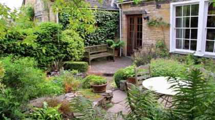 A view of the rear garden of Mary and Gordon Hayward at their cottage in Cotswold Hills, England.