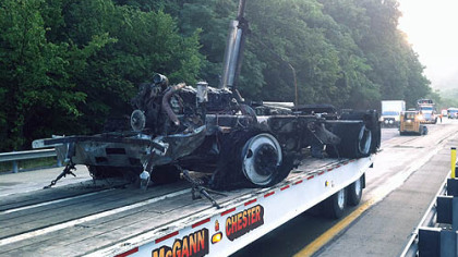 The cab of the mail truck was destroyed in the fire.