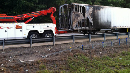 Part of the trailer of the mail truck that caught fire early Monday morning along Interstate 279.