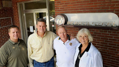 The Treser family poses for a portrait in front of their offices at Beaver Steel Services. From left, Kurt, Tony III, Tony Jr. and Rosemarie.