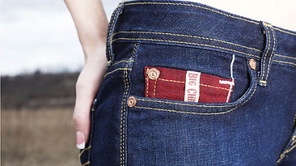Big Chief jeans logo on a red coin pocket, apparel designed by Brookline-based James Houk.