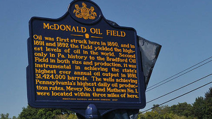 The historical marker noting the importance of the 19th century McDonald Oil Field was unveiled.