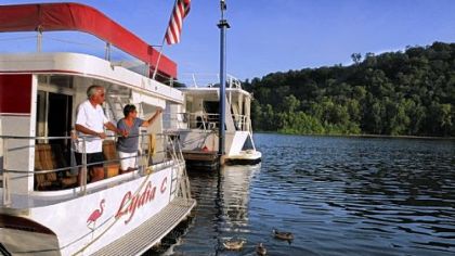 Bob and Lydia Cessna on the Lydia C, the Pluckebaum houseboat that they live on docked at Fox Chapel Marine on the Allegheny River.