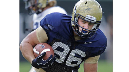 Pitt's J.P. Holtz goes through drills at practice Tuesday on the South Side.