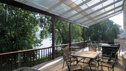 The covered deck of 7210 Front River Road, Neville Island, which is on the market for $398.000.