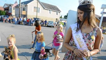 Coal Queen Ashley Avolio, 17, of Washington judges the cutest dog competition at the King Coal Association's Bituminous Coal Show Wednesday in Carmichaels.