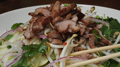 Vietnamese grilled pork noodle salad ($8.50) -- which includes grilled strips of pork served on a bed of rice vermicelli with fresh mint, basil, peanuts, bean sprouts and shredded raw vegetables in a spicy sweet dressing -- is a delicious entree at Spice Island Tea House in Oakland.