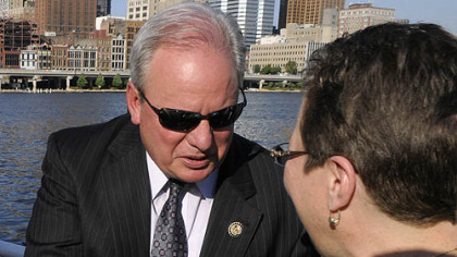 Mike Doyle greets Judy Yates.