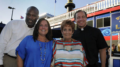 Rich Garth, Heidy O'Connor Garth, Judy O'Connor and Father Terry O'Connor.