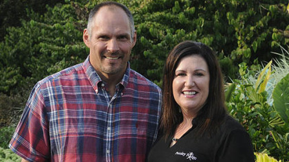 Steeler Jeff Harting and Pressley Ridge CEO Susanne Cole.