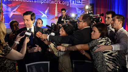 Puerto Rico Gov. Luis Fortuno was mobbed by reporters at a Hispanic Leadership Network event on Tuesday.