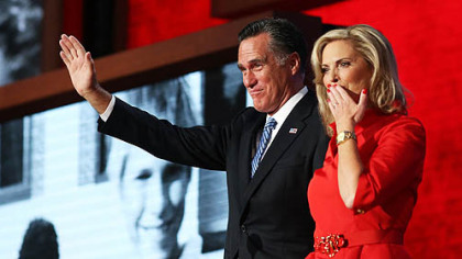 Republican presidential candidate Mitt Romney joins his wife, Ann Romney on stage during the Republican National Convention at the Tampa Bay Times Forum.