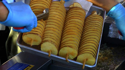 One of the most popular booths at the Richmond Night Market in Richmond, British Columbia, sells "Rotatos" -- spiral-cut potatoes on a stick.