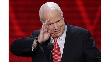 Sen. John McCain, R-Ariz., salutes before addressing the Republican National Convention in Tampa, Fla.