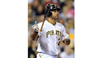 The Pirates' Pedro Alvarez watches his three-run shot in the third inning clear the right center wall against the Cardinals.