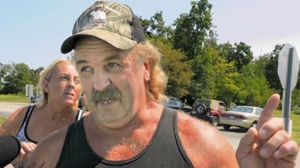 Barb Keltz and Jerry Lytle, mother and stepfather of Kayla Lyons, talk to the media after a news conference Thursday at state police barracks in Indiana, Pa., about the abuse charges brought against their daughter.