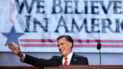 Republican presidential candidate Mitt Romney takes the stage to deliver his nomination acceptance speech during the final day of the Republican National Convention.