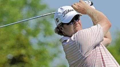 Brad Fritsch tees off on the 17th hole Friday en route to a 7-under 64 and the second-round lead in the Mylan Classic at Southpointe Golf Club. Fritsch leads by one.