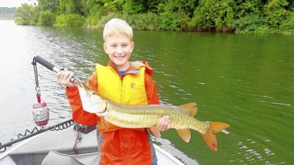 Mitchell Hills and his first musky.