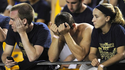 Pitt fans watch as their team falls further behind Youngstown State in the fourth quarter Saturday night at Heinz Field.