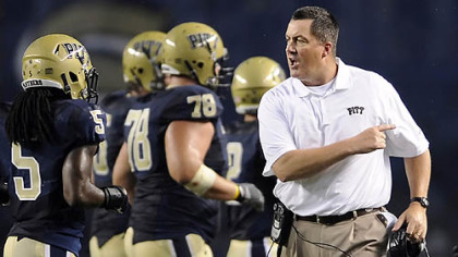 New coach Paul Chryst exhorts the Panthers in his Pitt debut Saturday night at Heinz Field.