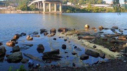Rocks that are submerged during normal flow form a hull-scraping shoal on the Monongahela River near the Birmingham Bridge. Water is down on lakes, rivers and streams throughout Western Pennsylvania.