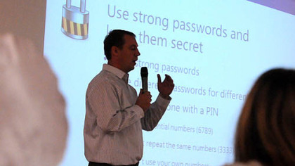 Pittsburgh Online Academy principal Mark McClinchie guides the 60 students enrolled in the new cyber school through a mandatory online security session during orientation.