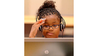 Eighth-grader Tayjanay Reed during orientation for students enrolled in the Pittsburgh Online Academy.