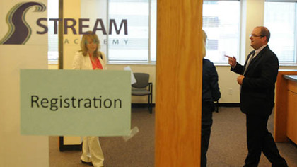 Principal David Martin walks through the offices of STREAM Academy, an online charter school that will offer in-person classes to its students at its Penn Center campus in Wilkins.