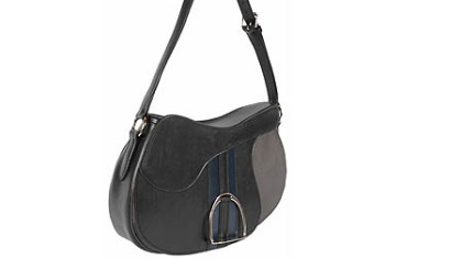 Rebecca Ray Lizzie's Saddle Bag is handcrafted in Ohio with superior grade saddle leather, ballistic nylon and nickel stirrup for $750. Go to www.rebeccaraydesign.com.

 

Constructed of superior grade saddle leather, accented by ballistic nylon, and marked by a nickel silver stirrup, this is a very special bag.
Available in 2 Colorways:  Pewter/Black, and Wheat/Chocolate
Dimensions: 10.5?T x 16?W x 4?D
Retail: $675
Availability:  Will be in stores late Fall, throughout North America, and online. 
HO   Original Filename: BlackSaddle.jpg