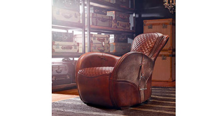 The hand-finished, hand-stitched leather Saddle Chair by Timothy Oulton with actual stirrups on either side. For more information, email Newyork@timothyoulton.com or visit www.timothyoulton.com