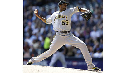 Pirates starting pitcher James McDonald throws to the Milwaukee Brewers during the first inning.