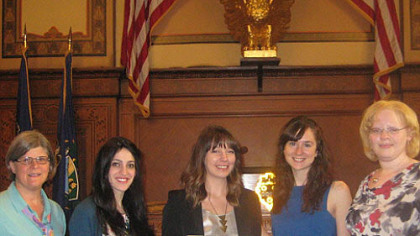 Left to right: instructor Kathy Hrabovsky; students Pia Naiditch, Eva Mueller and Ella Thompson; and Aftyn Giles, sustainability coordinator for the city.
