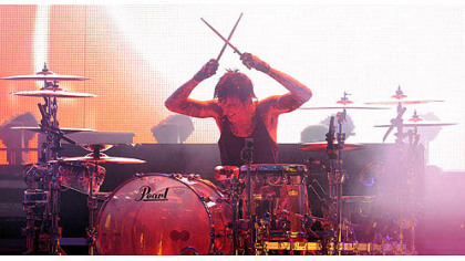 Tommy Lee plays drums for Motley Crue at First Niagara Pavilion Sunday night.