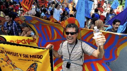 Eleazar Castellanos of Tuscon, Ariz., chants with fellow protesters about immigration laws during a protest march called "The March on Wall Street South" before the start of the Democratic National Convention in Charlotte, N.C., on Sunday.