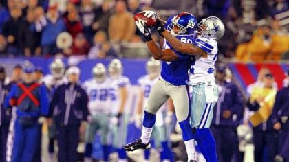 New York big-play receiver Victor Cruz makes a tough catch in front of Dallas defender Orlando Scandrick in the last game of the 2011 regular season -- that game that got the Giants into the playoffs, and they went on to win the Super Bowl.