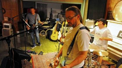 From left, Meeka in Jail band members Rich Snyder, bass guitar, Jay Green, guitar and vocals, and Mo Heine, drums, rehearse.