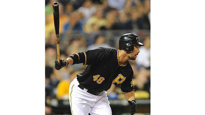 The Pirates' Garrett Jones singles in a run against the Astros.