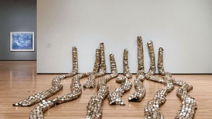 "Drainpipe," 2010, tin and copper wire, by El Anatsui at the Akron Art Museum.