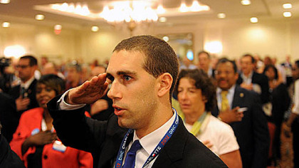 Alan Kennedy-Shaffer, an Army National Guard specialist from Harrisburg, salutes during the Pledge of Allegiance at the final Pennsylvania Delegation breakfast this morning at the Democratic National Convention in Charlotte, N.C.