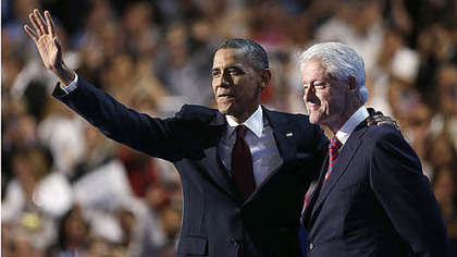 President Barack Obama waves after Former President Bill Clinton addresses the Democratic National Convention in Charlotte, N.C.