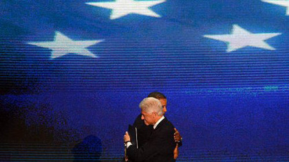 President Barack Obama and former President Bill Clinton embrace after Clinton's speech on day two of the Democratic National Convention in Charlotte, N.C.