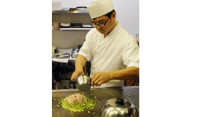 Teppanyaki Kyoto chef and owner Kevin Chen at the griddle.