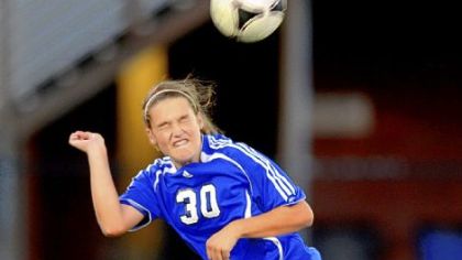 South Park sophomore Victoria Kraemer heads the ball in a soccer match Wednesday at West Mifflin. South Park won, 4-0.