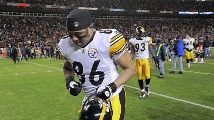 Hines Ward runs off the field in Denver after last season's playoff loss. It was Ward's last game for the Steelers.